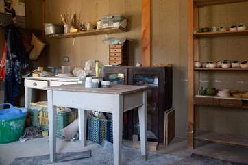 Book a pottery lesson in advance with the owner.