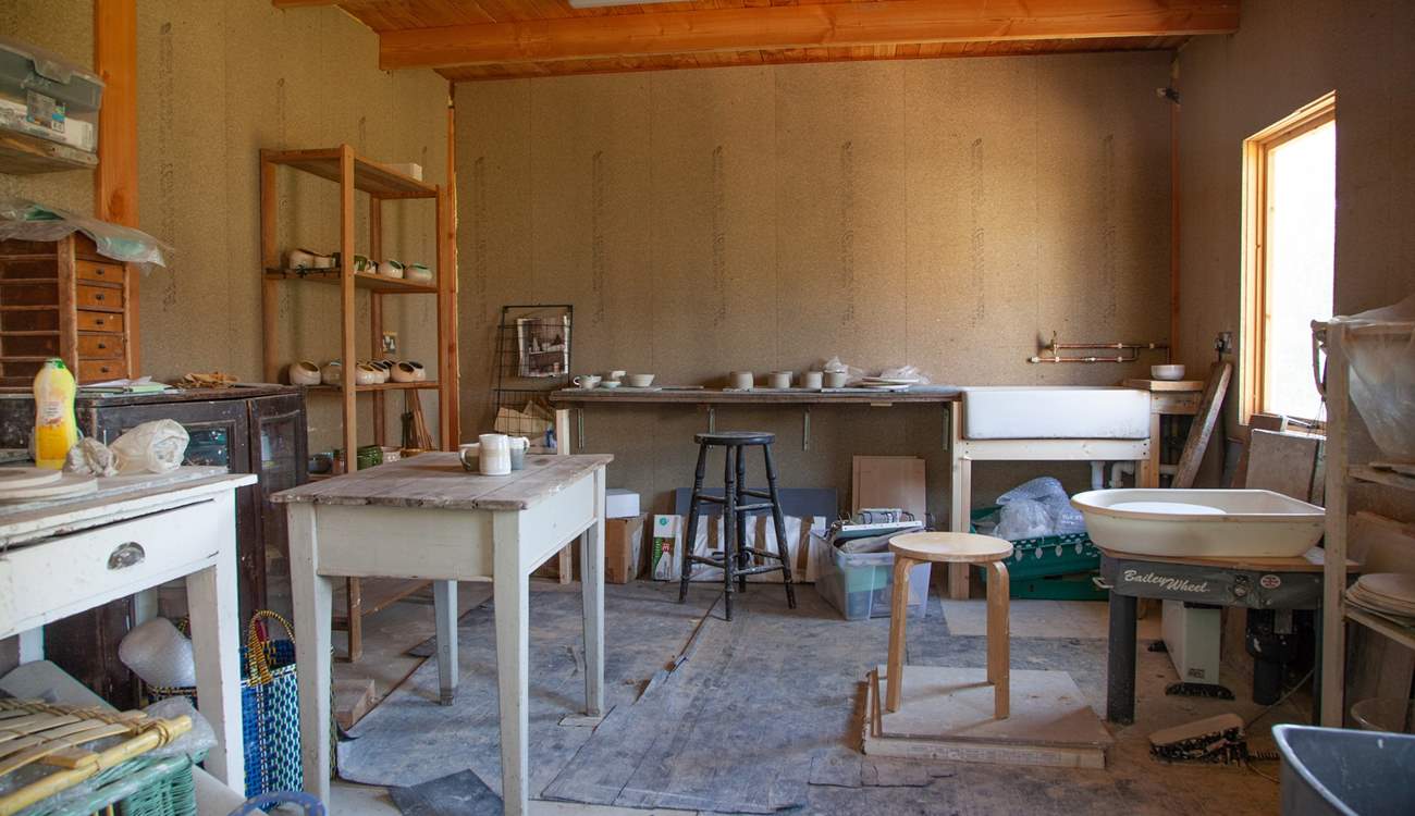 Book a pottery lesson in advance with the owner.