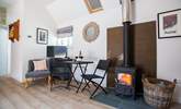 Relax by the cosy wood-burner. - Thumbnail Image