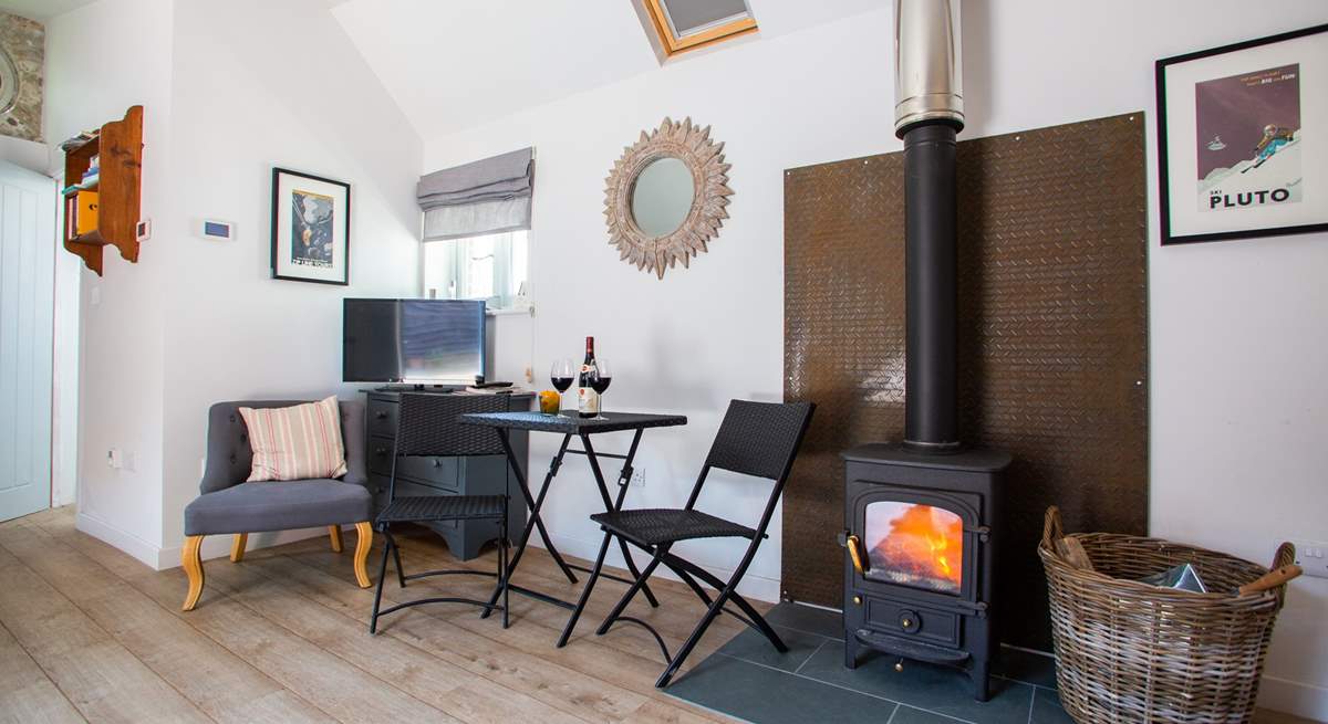 Relax by the cosy wood-burner.