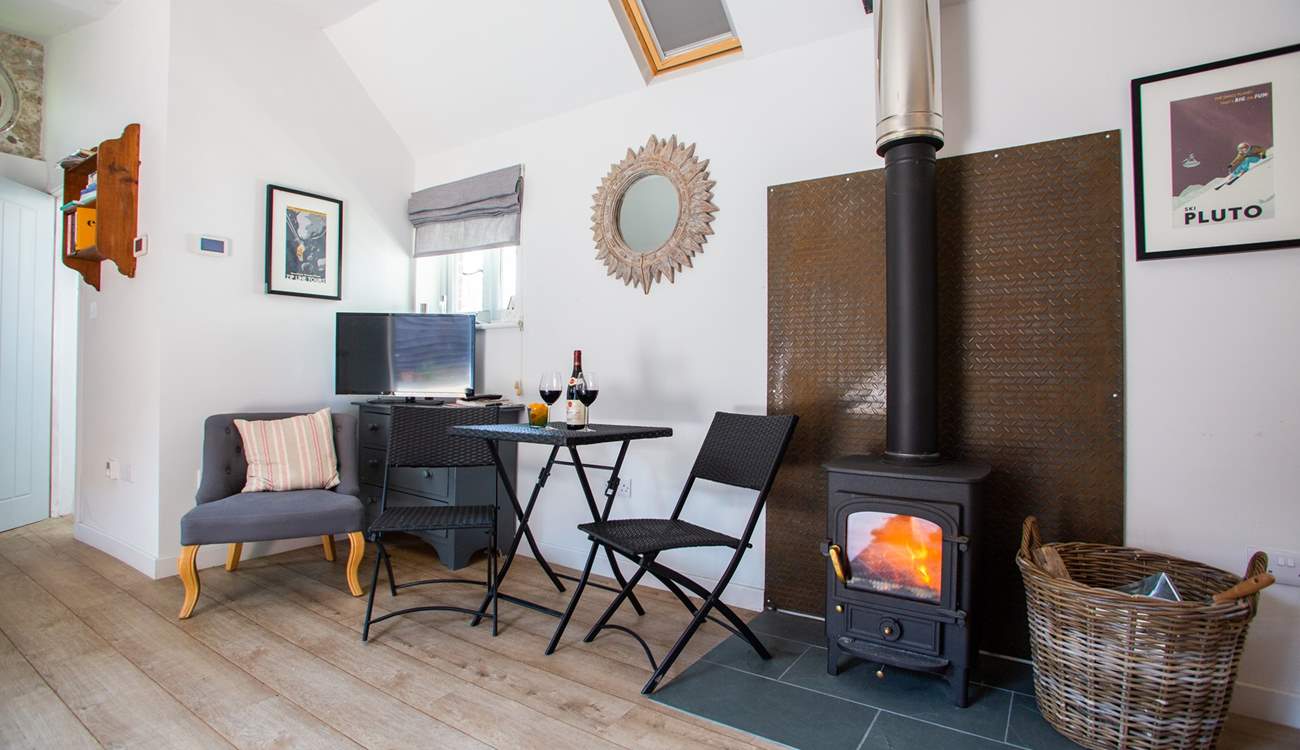 Relax by the cosy wood-burner.