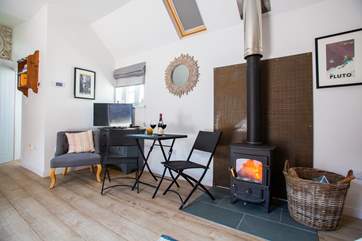 Relax by the cosy wood-burner.
