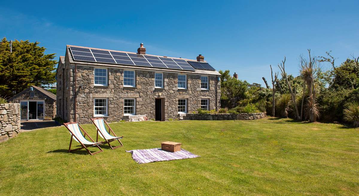 There is room to relax, play and kick a ball in the large lawned garden to the front of this pretty stone cottage.