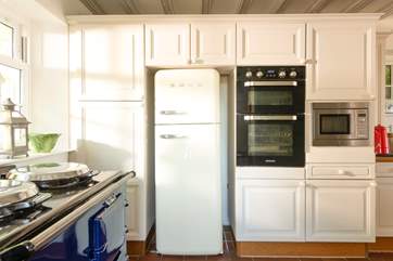 Double oven and built-in microwave plus the electric Aga, Sunday roast will be a breeze!
