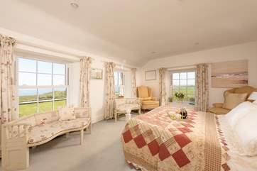 This fabulous master bedroom is triple aspect, so sea views times three!