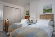 This twin-room also looks over the garden to the sea beyond and with such comfy beds you may want to stay put!