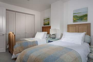This twin room also looks over the garden to the sea beyond and with such comfy beds you may want to stay put!