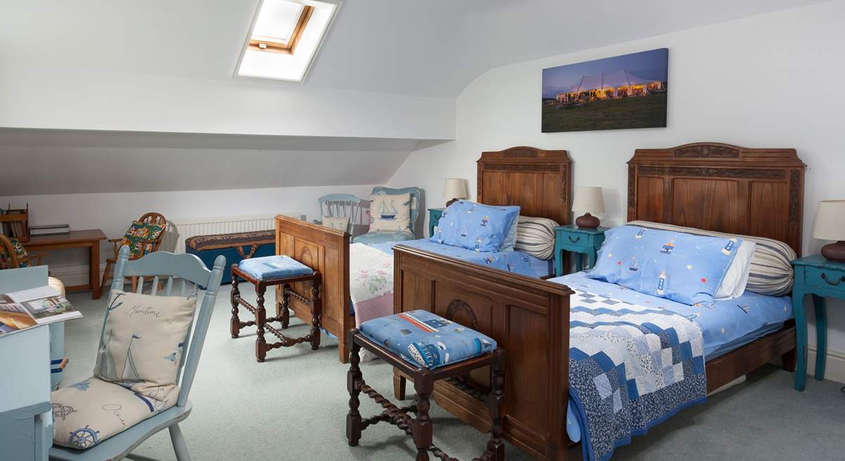 Antique beds in the spacious twin-room.