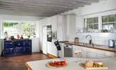 The spacious kitchen with oodles of food prep workspace for culinary masterpieces.  - Thumbnail Image