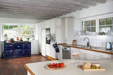 The spacious kitchen with oodles of food prep workspace for culinary masterpieces.