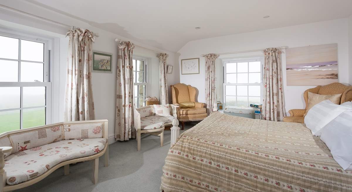 This fabulous main bedroom is triple aspect, so sea views times three!