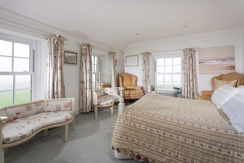 This fabulous main bedroom is triple aspect, so sea views times three!