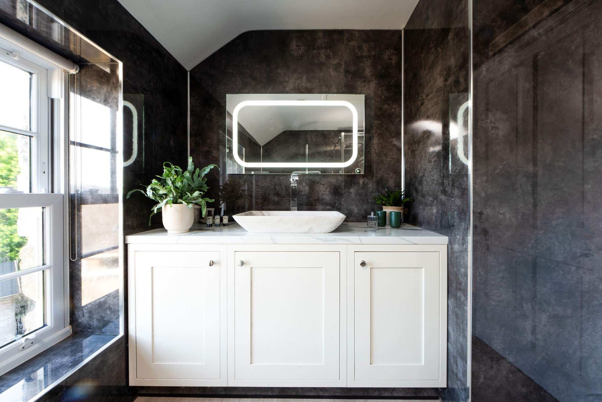 The sleek and modern shower-room on the first floor.