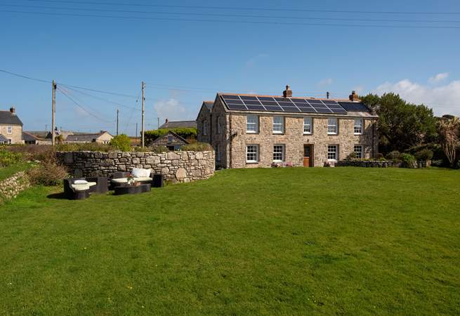 There is an enormous lawn and lounge area with incredible sea views.