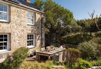 The sunny terrace has a Mediterranean feel and is sheltered from the elements.