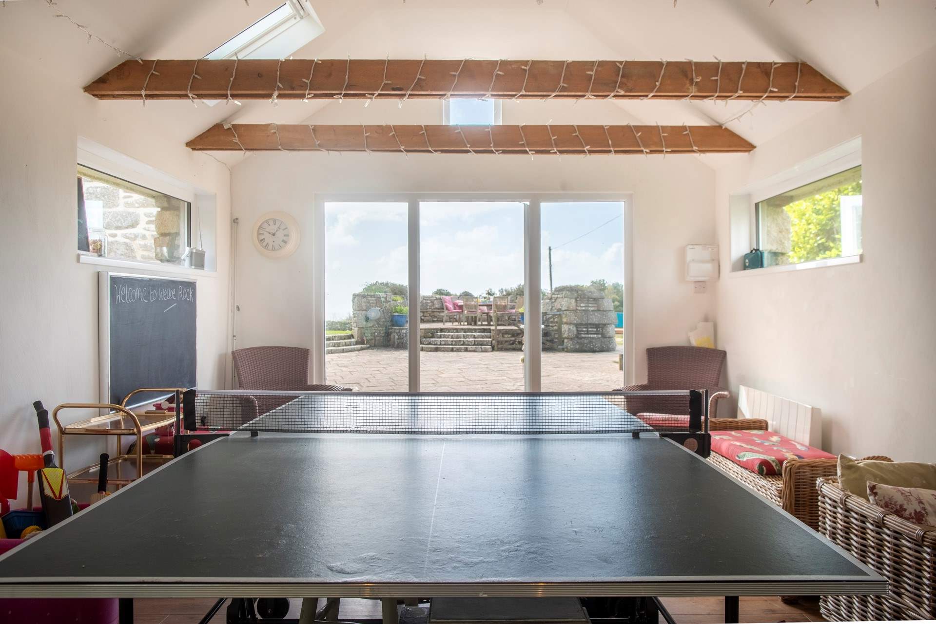 Challenge your loved ones to a game of table tennis.