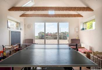 Challenge your loved ones to a game of table tennis.