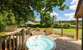 Relax in the hot tub, snooze on the sun-loungers or dine al fresco - bliss!  - Thumbnail Image