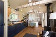 The living space is open plan and decorated beautifully.