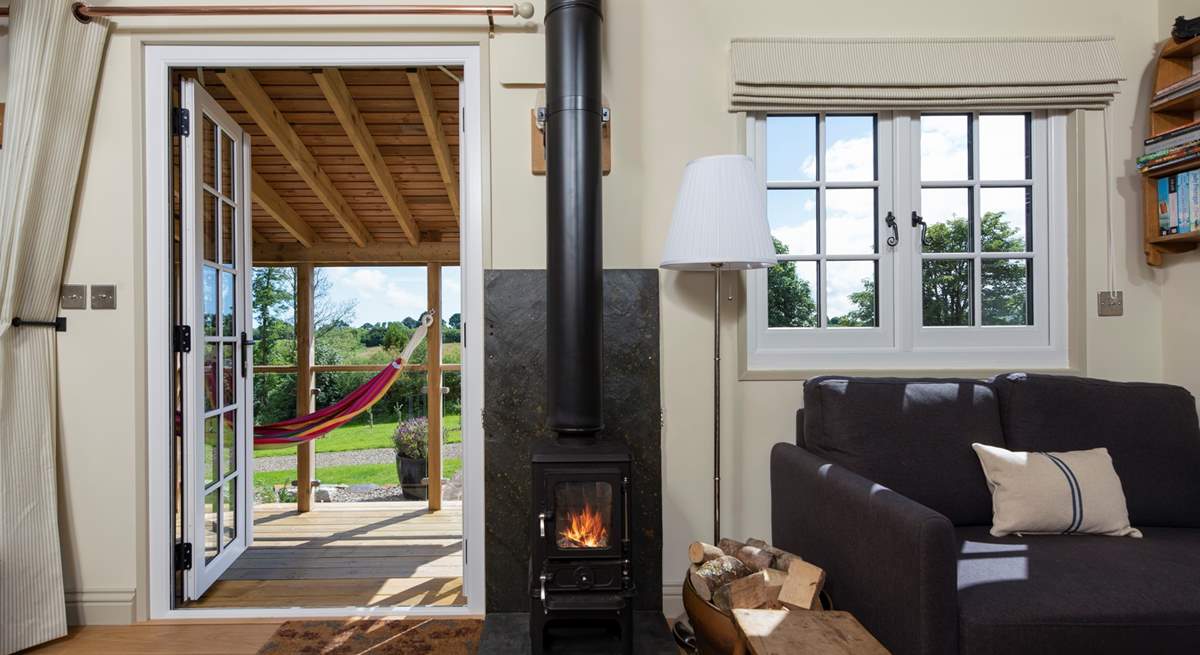 The warming wood-burner ensures year-round cosiness to supplement the underfloor heating.