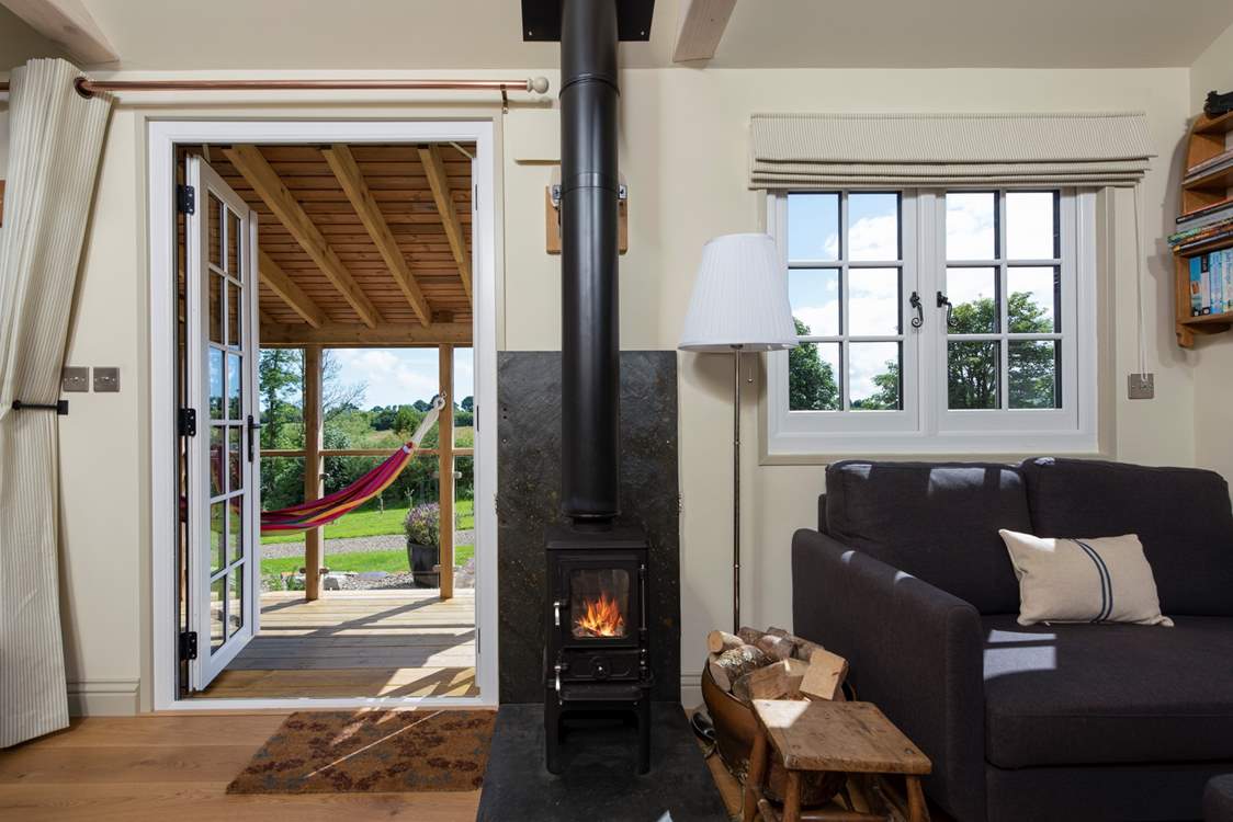 The warming wood-burner ensures year-round cosiness to supplement the underfloor heating.