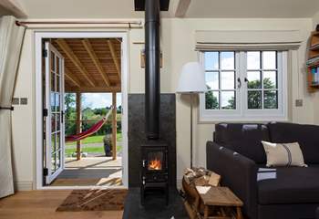 The warming wood-burner ensures year-round cosiness to supplement the underfloor heating.