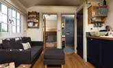 The bunk bedroom and shower-room are located at the opposite end of the cabin to the double bed.  - Thumbnail Image