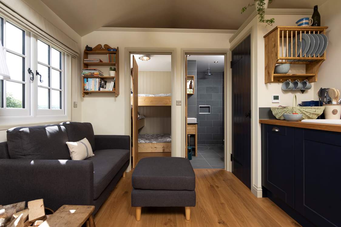 The bunk bedroom and shower-room are located at the opposite end of the cabin to the double bed.