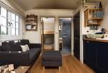 The bunk bedroom and shower-room are located at the opposite end of the cabin to the double bed. 