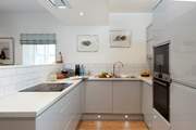 You have a fabulous modern kitchen at Poppy Cottage with lots of work space. 