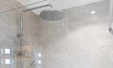 The shower has a lavish drench shower head. - Thumbnail Image