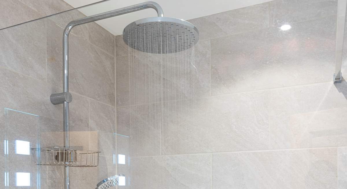 The shower has a lavish drench shower head.