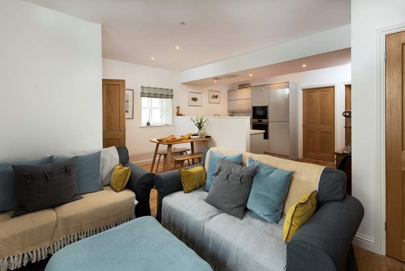 Two very comfy sofas await you, perfect to sink into after a day out walking the coast path. 