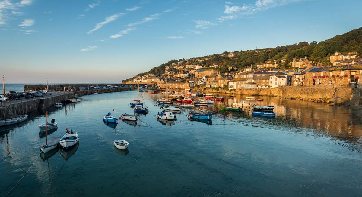 The idyllic seaside village of Mousehole is a short drive away.