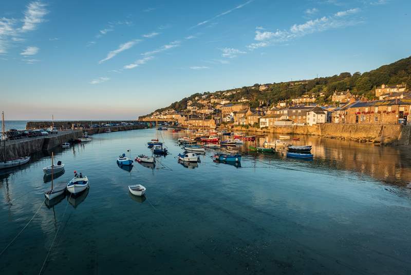 The idyllic seaside village of Mousehole is a short drive away.