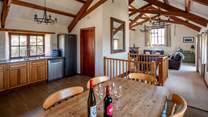 Looking back into the living area from the kitchen and dining area.