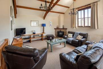 Large living-area. Perfect for snuggling up in front of the TV after a long day on the beach.