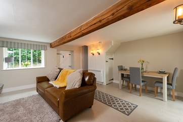 The open plan space is cosy and a perfect space to relax.