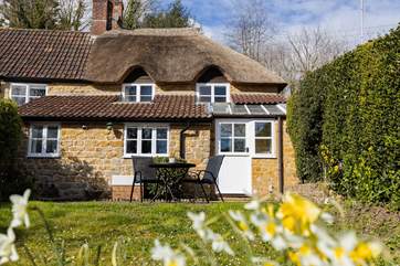 The back of Wayside Cottage is just as pretty as the front and the patio is a real sun-trap.