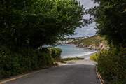 Porthcurnick Beach awaits at the bottom of the lane.