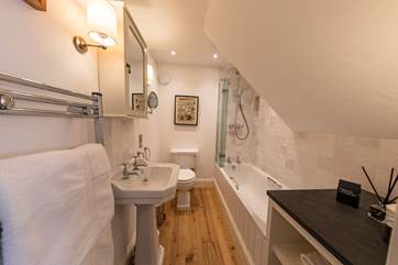 The en suite bathroom to Bedroom 1.