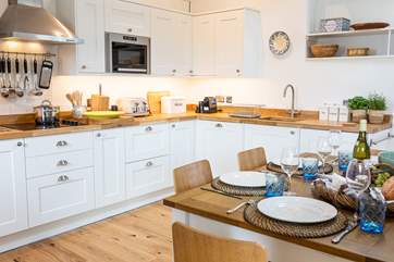 The dining-table is large enough to seat six to eight so family or friends staying in one of the other barns can join for supper.