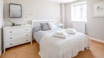 One of the many beautifully decorated bedrooms (bedroom 1). Light, airy and spacious.