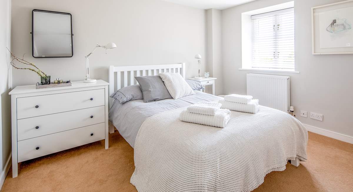 One of the many beautifully decorated bedrooms (bedroom 1). Light, airy and spacious.