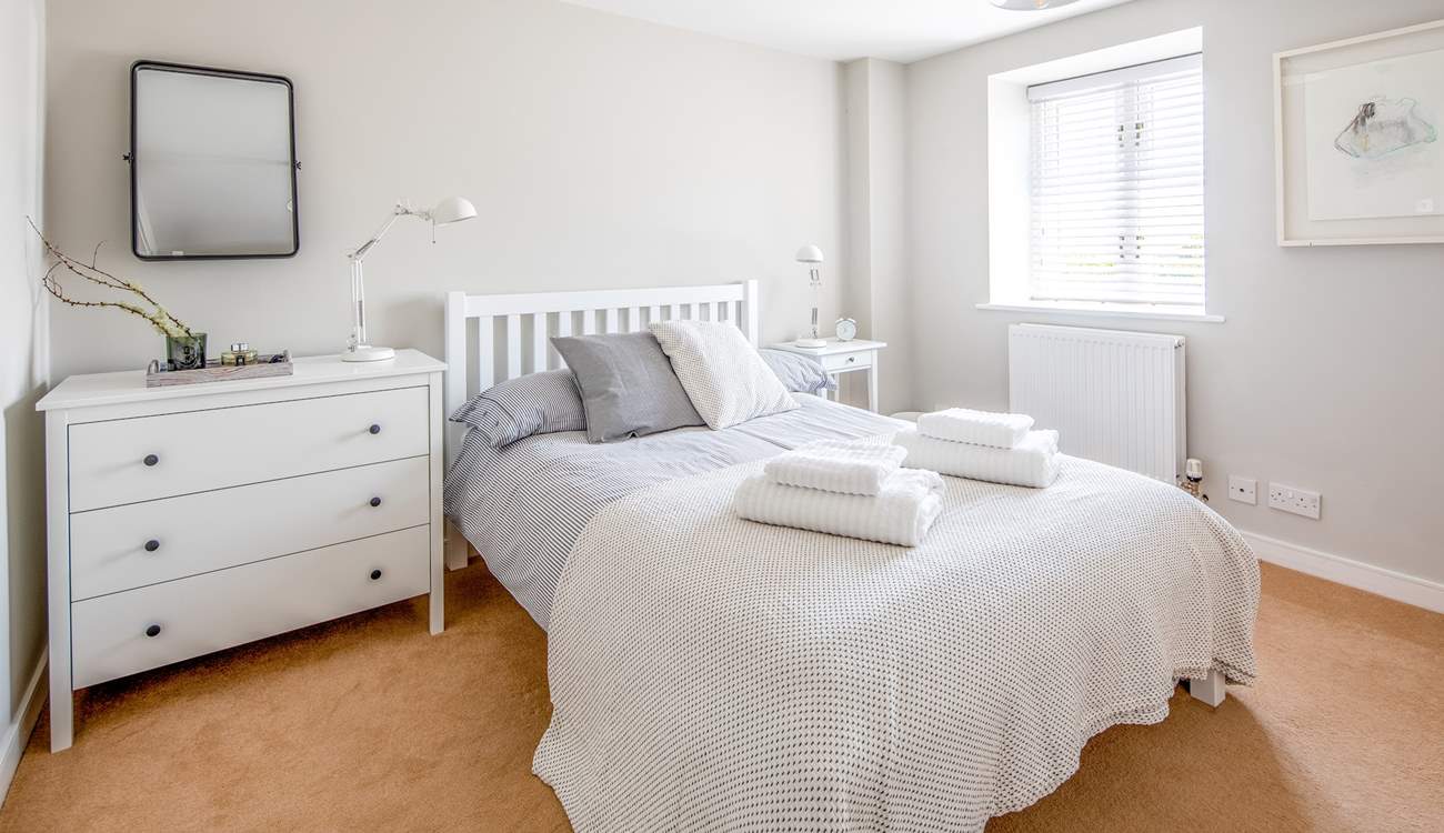 One of the many beautifully decorated bedrooms (bedroom 1). Light, airy and spacious.