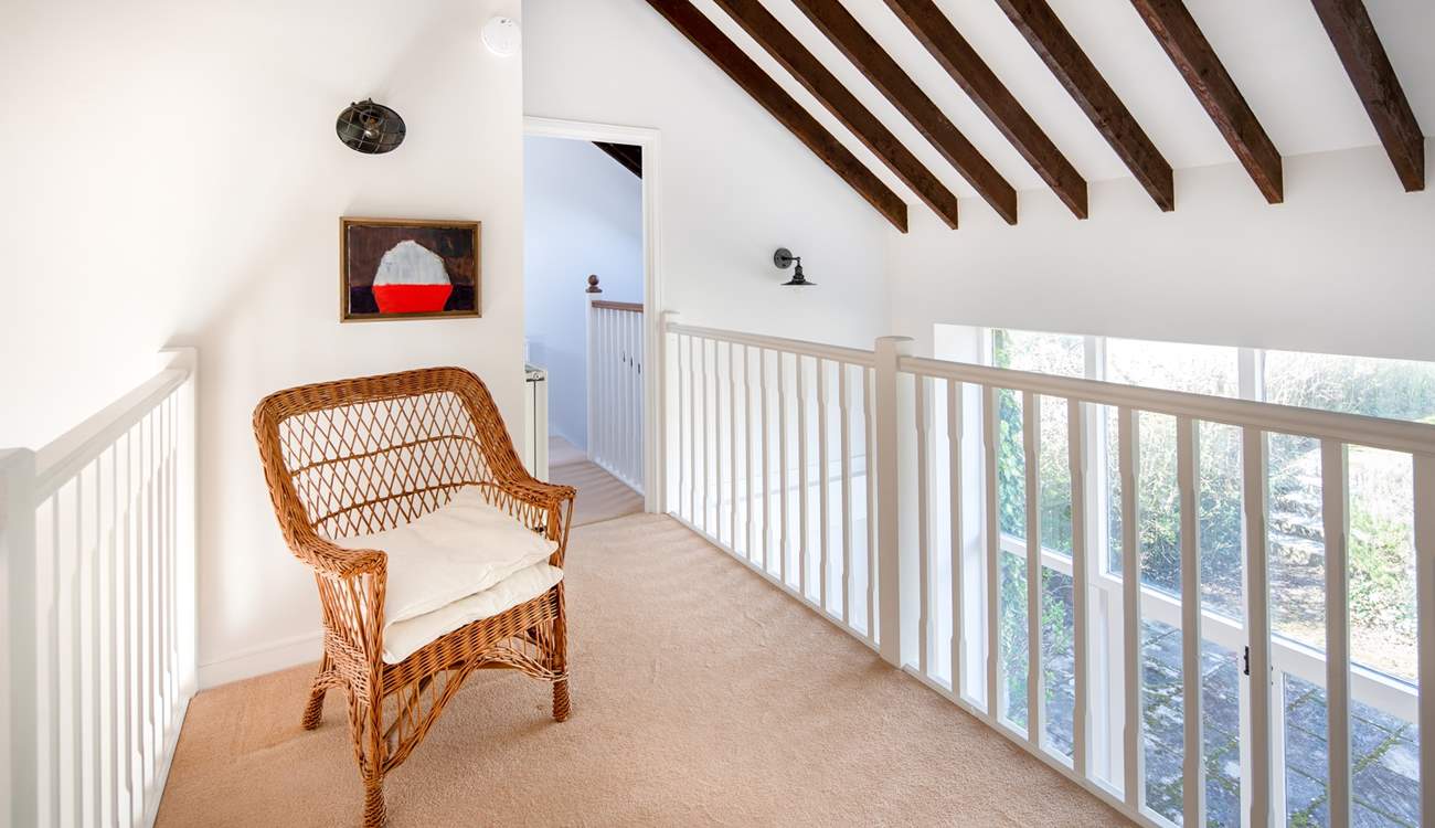 The landing which connects the rooms on the third floor.