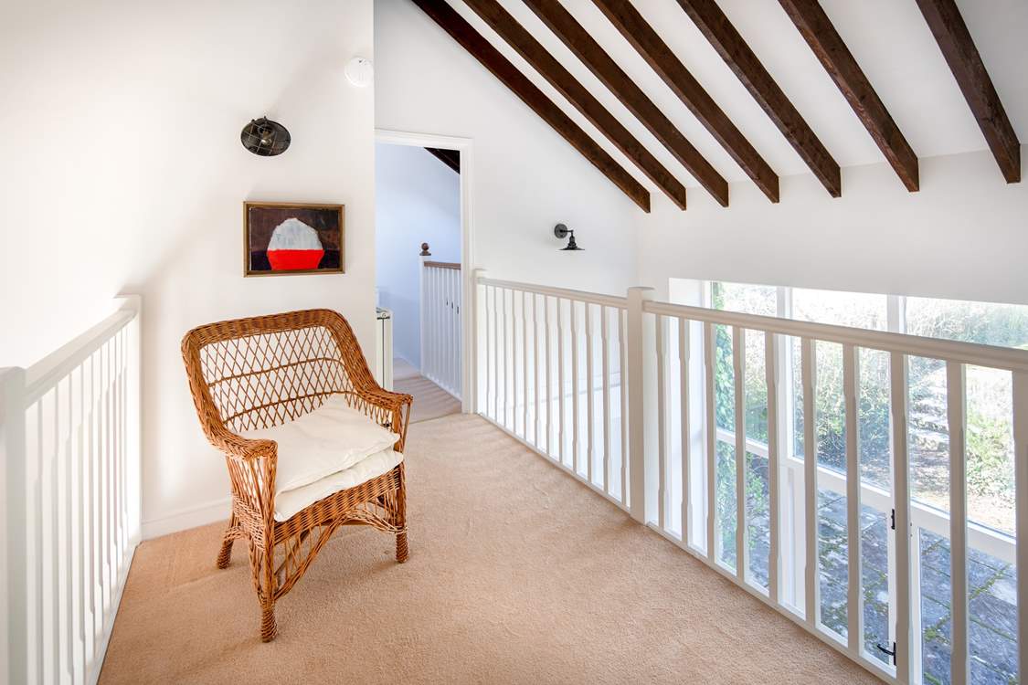 The landing which connects the rooms on the third floor.