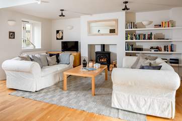 Great open plan living space with a rather large wood-burner, perfect for those chillier nights in.