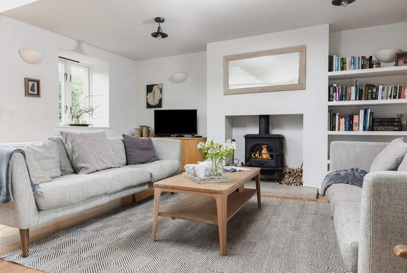 Great open plan living space with a rather large wood-burner, perfect for those chillier nights in.