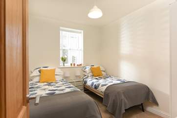 Bedroom 2 is bright and very cosy.